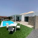 Вилла 2 bedrooms villa with sea view private pool and enclosed garden at El Roque El Cotillo 1 km away from the beach