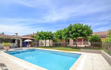 Amazing home in Fourques with 4 Bedrooms, WiFi and Outdoor swimming pool