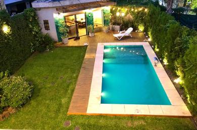 Дом отдыха Casa de 280 mts Jardín con Piscina climatizada.