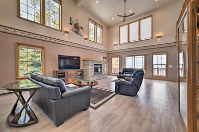 Spacious Lakefront Home with Sunroom and Bar!