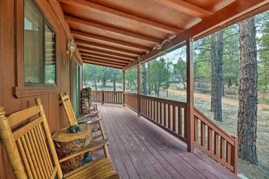 Quiet Cabin with Wraparound Deck in Forest!