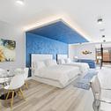 Отель Global Luxury Suites at The Arches