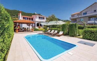 Holiday home Amazing home in Banjol with 3 Bedrooms, WiFi and Outdoor swimming pool
