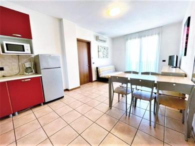 Apartments Lovely apartment in Caorle with shared garden