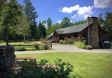 Lodge on Big Brook adjoining state easement Hunter’s/snowmobile paradise