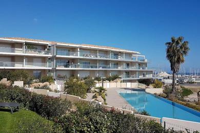 Апартаменты Corsicacasa Appartement de luxe en bord de mer pour 4 pers dans résidence avec piscine à débordement