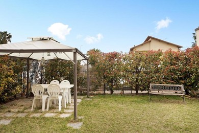 Апартаменты B179 Riva- trilocale con giardino