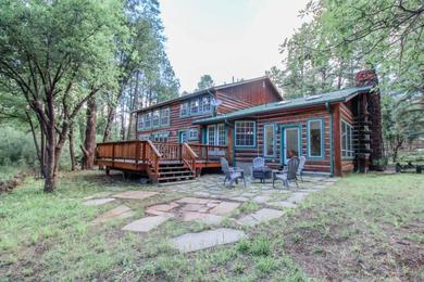 Holiday home 4,100 sf Luxury Log Cabin on the Creek Sleeps 18 and Right in Town
