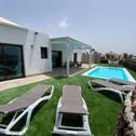 Вилла 2 bedrooms villa with sea view private pool and enclosed garden at El Roque El Cotillo 1 km away from the beach