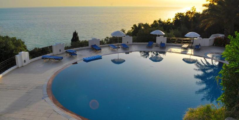 Apartments Holiday house with pool Maria on Agios Gordios Beach