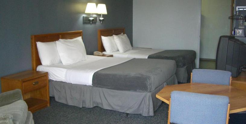 Отель Quail's Nest Inn & Suites