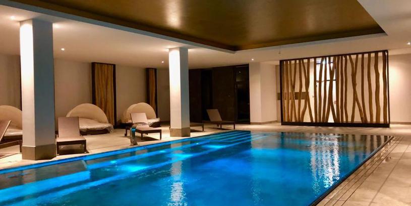 Апарт-отель Sunny Suite 14 - elegantes Hotelapartment mit großem Pool-Wellnesbereich und seitlichem Meerblick