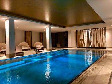 Aparthotel Sunny Suite 14 - elegantes Hotelapartment mit großem Pool-Wellnesbereich und seitlichem Meerblick