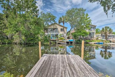 Spring Hill Home on Stilts with Canal Access!