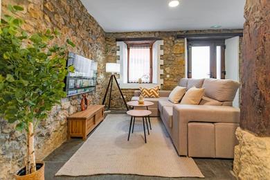 Apartments Precioso piso estilo rústico a 10 min de Santander
