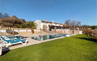 Holiday home Awesome home in Cuevas de San Marcos with Outdoor swimming pool, WiFi and 7 Bedrooms