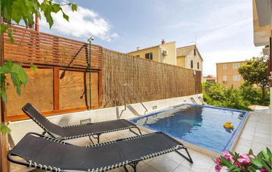 Holiday home Nice home in Komiza w/ Outdoor swimming pool, WiFi and 4 Bedrooms