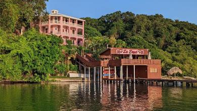 Hotel El Palacio Rosa on Blue Lagoon 3BR Beachfront Suite on pristine & quiet bay w incredible views