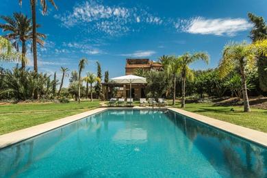 Вилла Villa YENMOZ en exclusivité avec piscine privée dans la Palmeraie