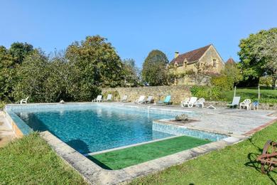 Holiday home Maison de 2 chambres avec piscine partagee et jardin amenage a Beynac et Cazenac