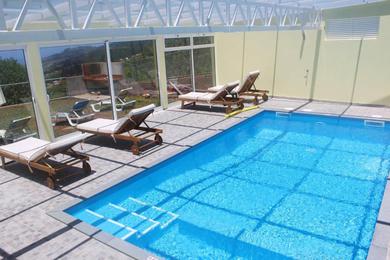 Holiday home 2 bedrooms house with shared pool and wifi at Arco Da Calheta