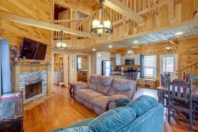 Отель Cozy Bryant Cabin with Indoor Pool Access and Hot Tub!