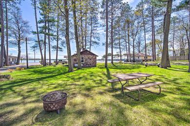 Holiday home Rustic Cabin with Fire Pit, Steps to Sand Lake!