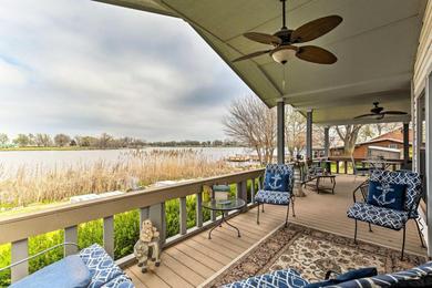 Serene Lakefront Getaway with Fire Pit and Grill!