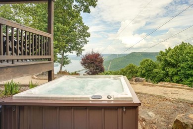 Отель Bryant Cabin Retreat Hot Tub and Breathtaking Views