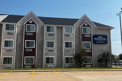 Отель Microtel Inn & Suites by Wyndham Houston/Webster/Nasa/Clearlake