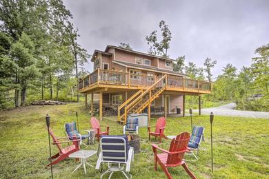 Serene Long Lake Cabin with Deck and Fire Pit!