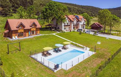 Holiday home Beautiful home in Donji Babin Potok with WiFi, Outdoor swimming pool and 2 Bedrooms