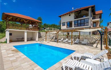 Apartments Beautiful apartment in Rakovica w/ Outdoor swimming pool, WiFi and 1 Bedrooms