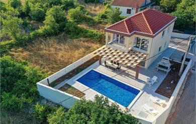 Hotel Stunning Home In Primorski Dolac With Outdoor Swimming Pool, Wifi And 4 Bedrooms