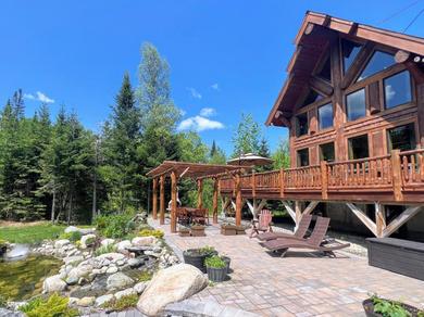 Отель WML stunning log home in Bretton Woods, AC, 2-person Jacuzzi, indoor and outdoor fireplaces, & more!