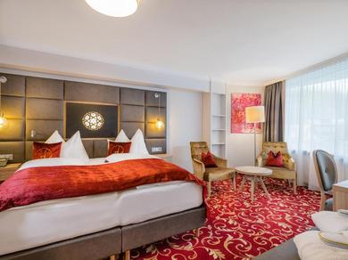 Отель Hotel Norica - Thermenhotels Gastein mit dem Bademantel direkt in die Therme