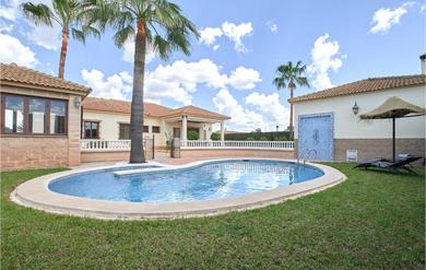 Holiday home Nice home in La Carlota with Outdoor swimming pool, WiFi and 4 Bedrooms