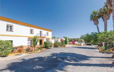 Holiday home Nice home in Huelva with 6 Bedrooms and Outdoor swimming pool