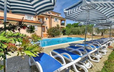 Apartments Stunning apartment in Basanija with 2 Bedrooms, WiFi and Outdoor swimming pool