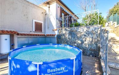Holiday home Awesome home in Loiri Porto San Paolo with 1 Bedrooms and WiFi