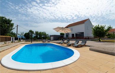 Awesome home in Pridraga with Outdoor swimming pool, WiFi and 4 Bedrooms