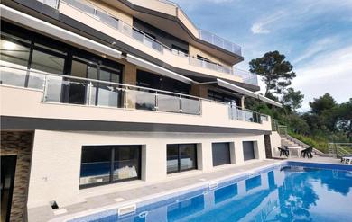 Amazing home in Santa Susanna with 6 Bedrooms, WiFi and Outdoor swimming pool