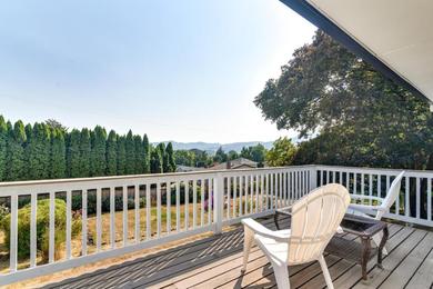 Отель Serene Forest Grove Home with Deck and Stunning Views!
