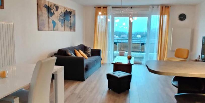 Апартаменты Appartement cosy avec balcon vu Jura idéalement situé à 15 min du centre de Genève