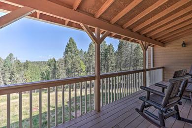 Hilltop Haven with Wraparound Deck and Mountain Views!
