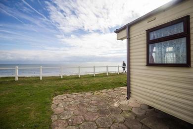 Campsite 6 berth caravan with full sea views at Hopton Holiday Village ref 80004OV