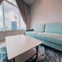 Апартаменты Family Suites at Sky Suites KLCC with Unblocked Sunset View on Top Floor